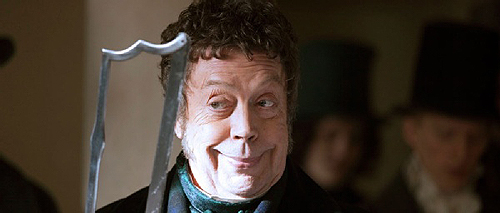 Tim Curry as Monro