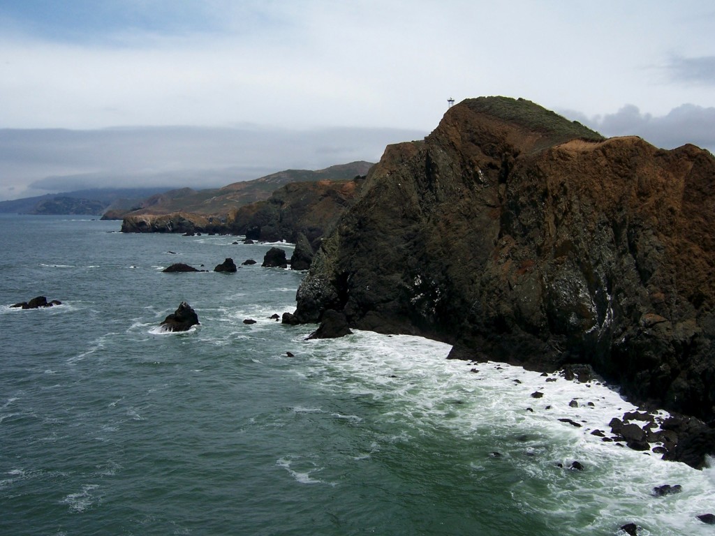 View to the north from the lighthouse. The highest point was the original site of the lighthouse. Due to our odd high fog, it had to be moved to its present location in 1877. Photo by Lastech